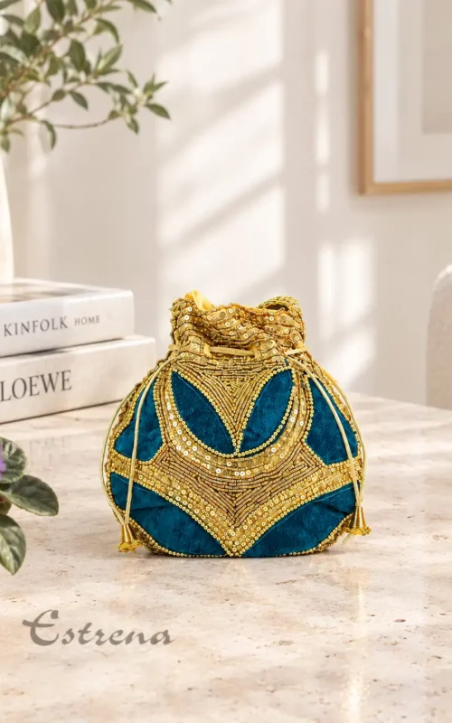 Bolso joya turquesa con bordados dorados y cierre fruncido